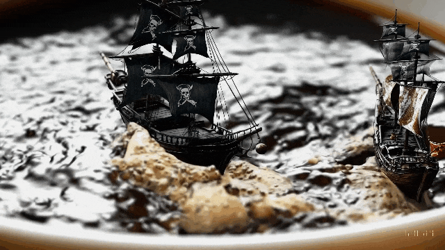 Sora:“逼真的特写视频，展示两艘海盗船在一杯咖啡内航行时互相争斗的场景。”